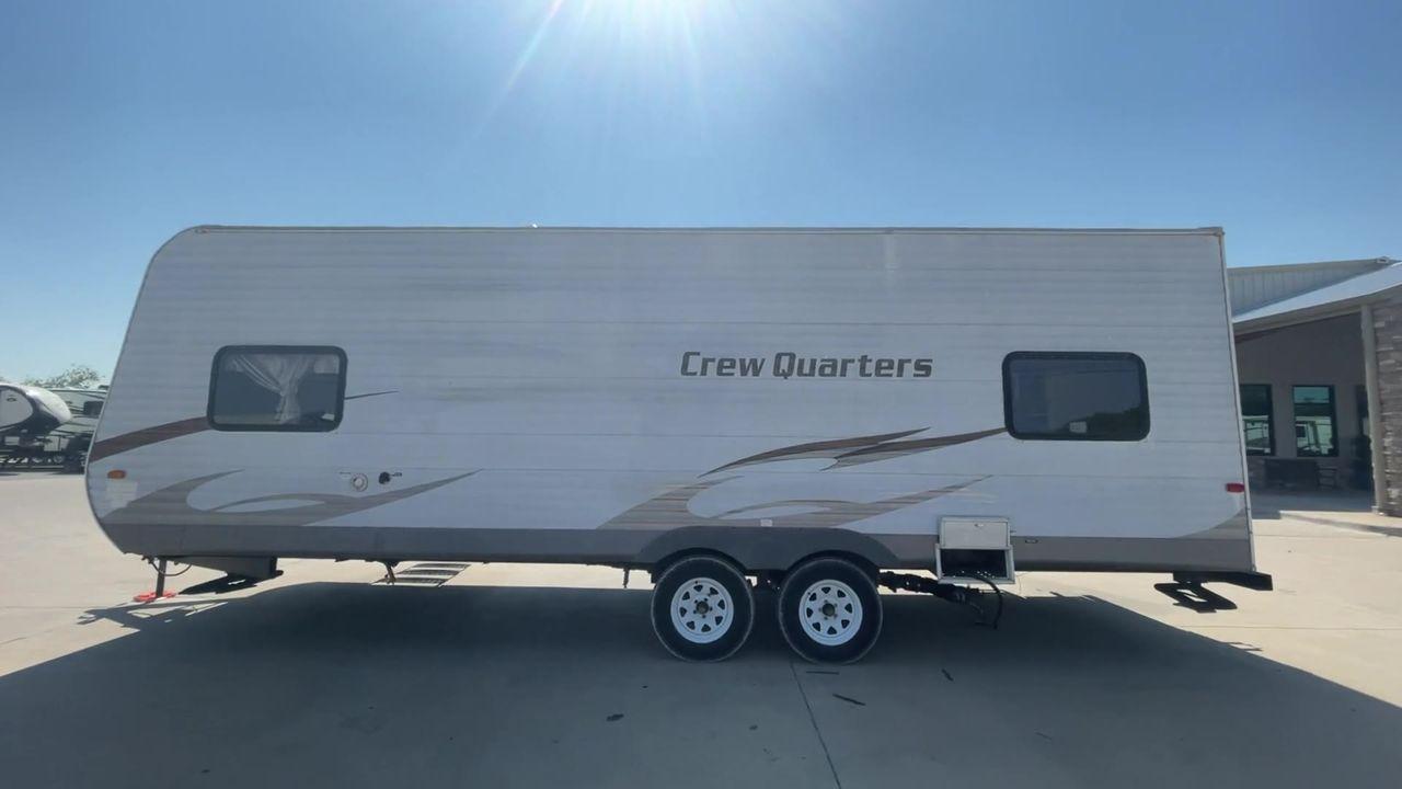 2010 WHITE FOREST RIVER CREW QUARTERS T24-2 - (4X4TWDZ21AR) , Dry Weight: 5,275 lbs | Gross Weight: 7,713 lbs | Slides: 0 transmission, located at 4319 N Main St, Cleburne, TX, 76033, (817) 678-5133, 32.385960, -97.391212 - The 2010 Crew Quarters T24-2 is a cute and cozy travel trailer that comes with lovely features that you would absolutely adore in a camper. It features a corner bunk bed with a nice window on the bottom bunk. It has a mini fridge, a microwave, and a solid surface counter space. A tall double-door ca - Photo #6