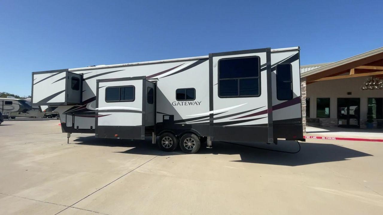 2017 TAN GATEWAY 3712RDMB - (5SFSG4228HE) , Length: 39.5 ft. | Dry Weight: 13,680 lbs. | Gross Weight: 15,500 lbs. | Slides: 4 transmission, located at 4319 N Main Street, Cleburne, TX, 76033, (817) 221-0660, 32.435829, -97.384178 - The 2017 Gateway 3712RDMB Fifth Wheel provides luxurious travel experiences. With a length of 39.5 feet and a dry weight of 13,680 pounds, this amazing RV provides large living accommodations and all of the conveniences you require for a comfortable travel. With a gross weight of 15,500 pounds and f - Photo #1