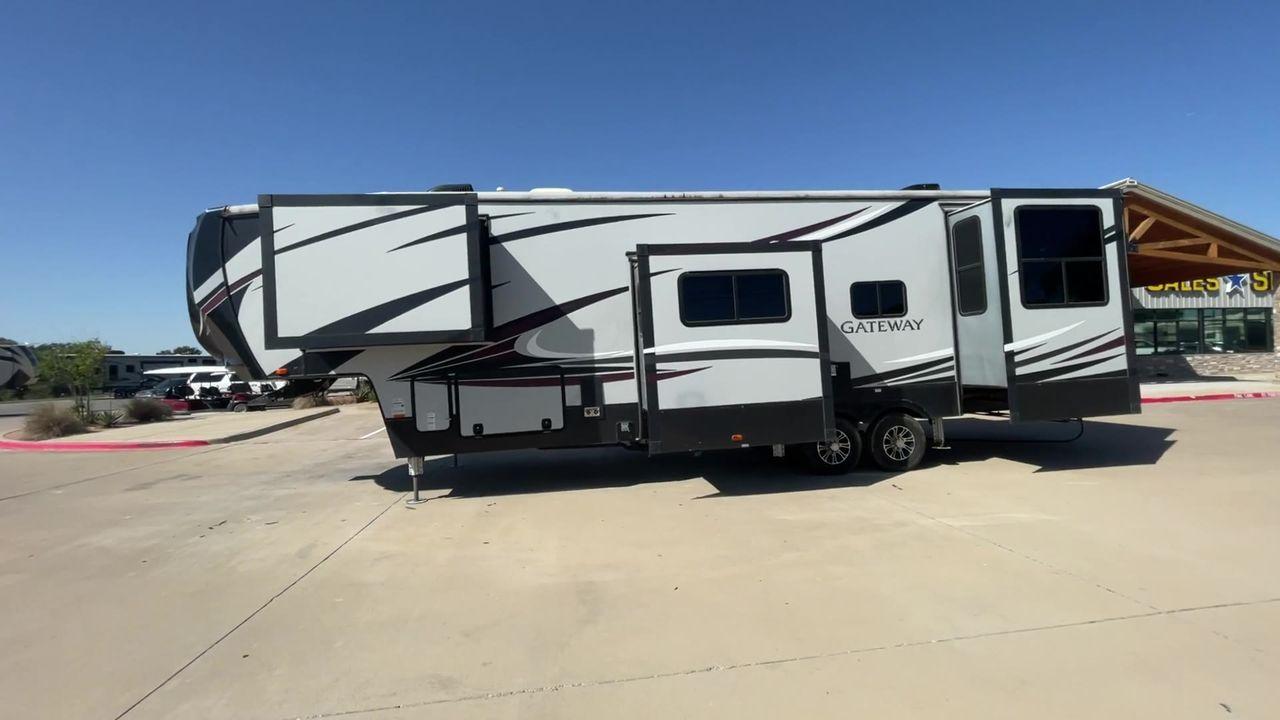 2017 TAN GATEWAY 3712RDMB - (5SFSG4228HE) , Length: 39.5 ft. | Dry Weight: 13,680 lbs. | Gross Weight: 15,500 lbs. | Slides: 4 transmission, located at 4319 N Main St, Cleburne, TX, 76033, (817) 678-5133, 32.385960, -97.391212 - Explore more reasons that emphasize the benefits of having this RV as your own. (1) It has Two TVs for entertainment in both the living area and the master bedroom. (2) It has Outside speakers bring the music outdoors for alfresco enjoyment. (3) It has a sleek and durable solid surface counter - Photo #8