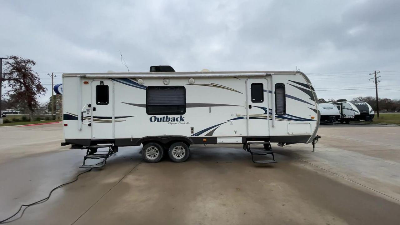 2012 WHITE KEYSTONE OUTBACK 272RK (4YDT27227CB) , Length: 30.33 ft. | Dry Weight: 5,976 lbs. | Gross Weight: 7,800 lbs. | Slides: 1 transmission, located at 4319 N Main St, Cleburne, TX, 76033, (817) 678-5133, 32.385960, -97.391212 - Photo #2