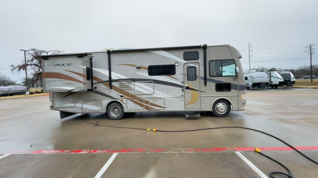 2014 TAN ACE 30.1 - (1F65F5DY8E0) , located at 4319 N Main St, Cleburne, TX, 76033, (817) 678-5133, 32.385960, -97.391212 - Discover extra features that contribute to making this RV an ideal investment. (1) This 30-foot beauty offers ample living space, the slide-out expands the main living area. (2) It has The Ford F-Series Super Duty chassis with a Triton V10 engine offers robust power and handling (3) It is also - Photo #2