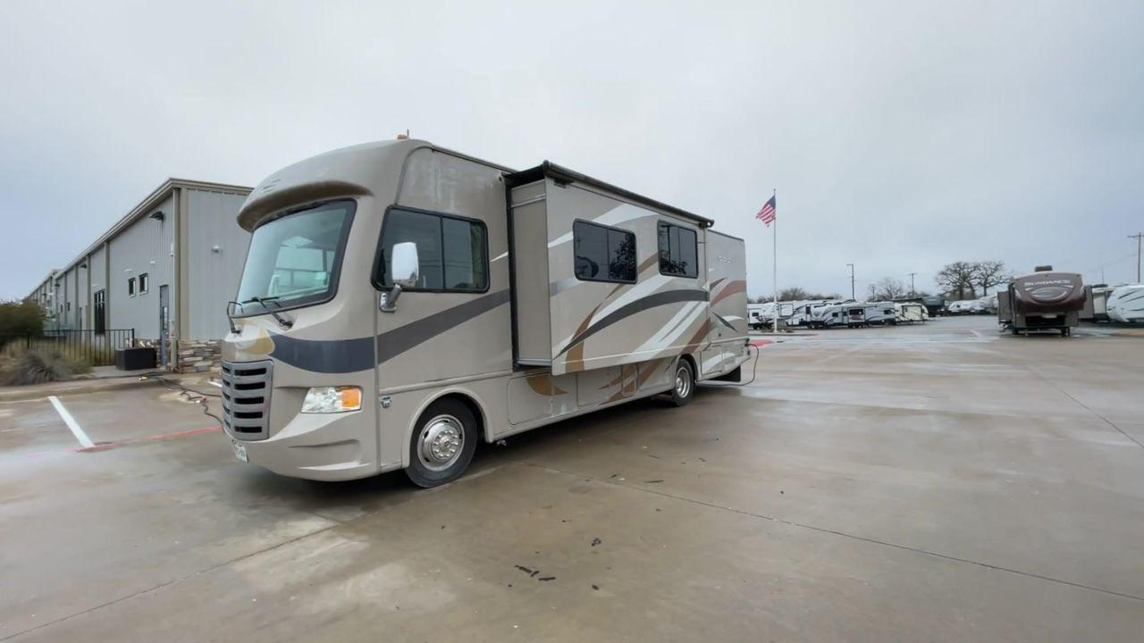 2014 TAN ACE 30.1 - (1F65F5DY8E0) , located at 4319 N Main St, Cleburne, TX, 76033, (817) 678-5133, 32.385960, -97.391212 - Discover extra features that contribute to making this RV an ideal investment. (1) This 30-foot beauty offers ample living space, the slide-out expands the main living area. (2) It has The Ford F-Series Super Duty chassis with a Triton V10 engine offers robust power and handling (3) It is also - Photo #5
