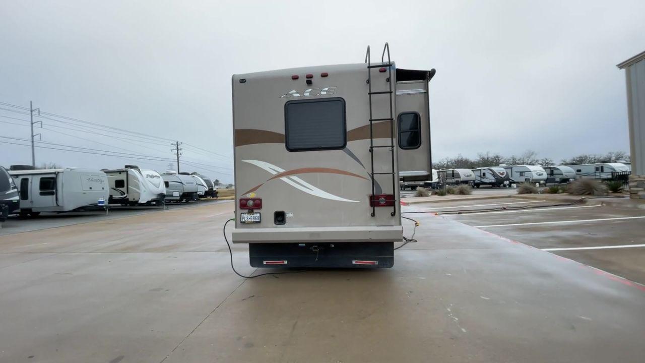 2014 TAN ACE 30.1 - (1F65F5DY8E0) , located at 4319 N Main Street, Cleburne, TX, 76033, (817) 221-0660, 32.435829, -97.384178 - Discover extra features that contribute to making this RV an ideal investment. (1) This 30-foot beauty offers ample living space, the slide-out expands the main living area. (2) It has The Ford F-Series Super Duty chassis with a Triton V10 engine offers robust power and handling (3) It is also - Photo #8