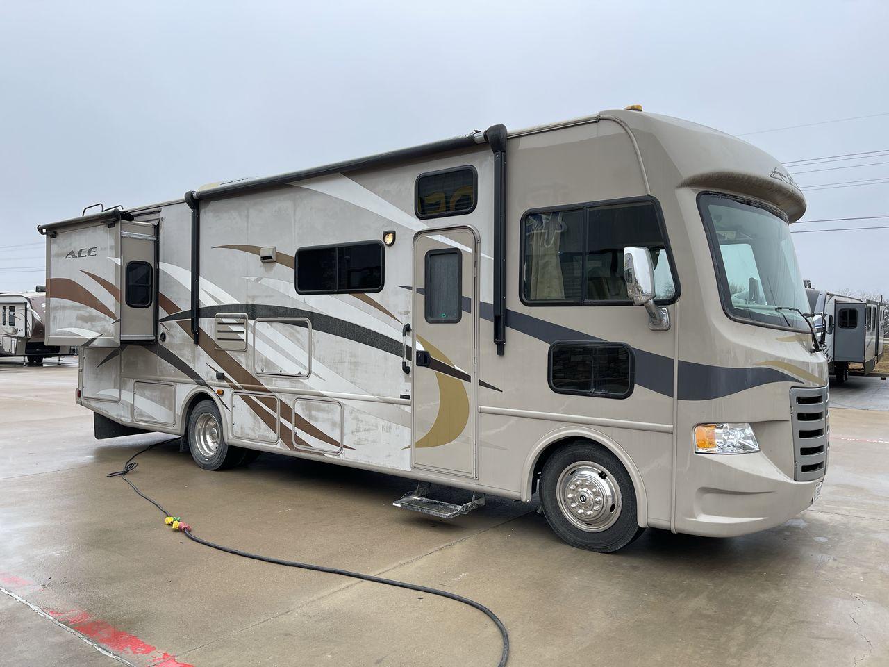 2014 TAN ACE 30.1 - (1F65F5DY8E0) , located at 4319 N Main Street, Cleburne, TX, 76033, (817) 221-0660, 32.435829, -97.384178 - Discover extra features that contribute to making this RV an ideal investment. (1) This 30-foot beauty offers ample living space, the slide-out expands the main living area. (2) It has The Ford F-Series Super Duty chassis with a Triton V10 engine offers robust power and handling (3) It is also - Photo #23