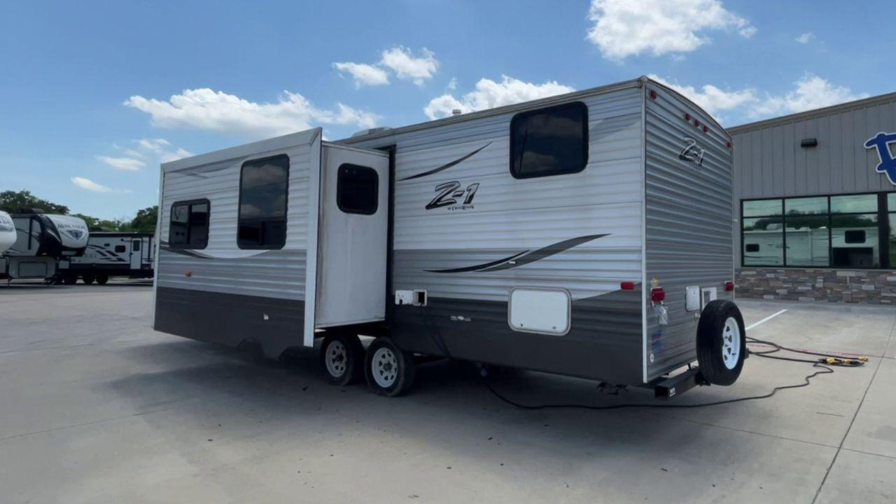 2016 WHITE CROSSROADS Z1 302KB - (4V0TC3027GJ) , Length: 32.75 ft. | Dry Weight: 6,244 lbs. | Gross Weight: 7,796 lbs. | Slides: 1 transmission, located at 4319 N Main St, Cleburne, TX, 76033, (817) 678-5133, 32.385960, -97.391212 - Set out on an easy and convenient adventure with the 2016 Crossroads Z1 302KB travel trailer. Families and travelers looking for a home away from home will love this well-thought-out RV. The dimensions for this unit are 32.75 ft in length by 10.92 ft in height. It has a dry weight of 6,244 lbs with - Photo #1