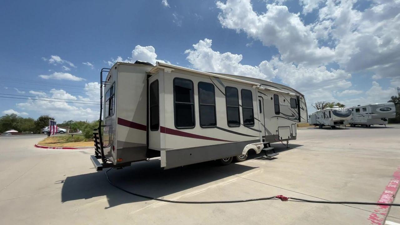 2014 TAN SABRE 34REQS-6 (4X4FSRK2XE3) , Length: 36 ft. | Dry Weight: 10,854 lbs. | Gross Weight: 13,704 lbs. | Slides: 4 transmission, located at 4319 N Main Street, Cleburne, TX, 76033, (817) 221-0660, 32.435829, -97.384178 - This RV, which measures 36 feet in length and weighs 10,854 pounds dry, is designed to provide a luxurious and sumptuous living experience when traveling. With a gross weight of 13,704 pounds and four slides, including one in the bedroom, the 2014 Sabre 3REQS-6 Fifth Wheel will allow you plenty of s - Photo #1