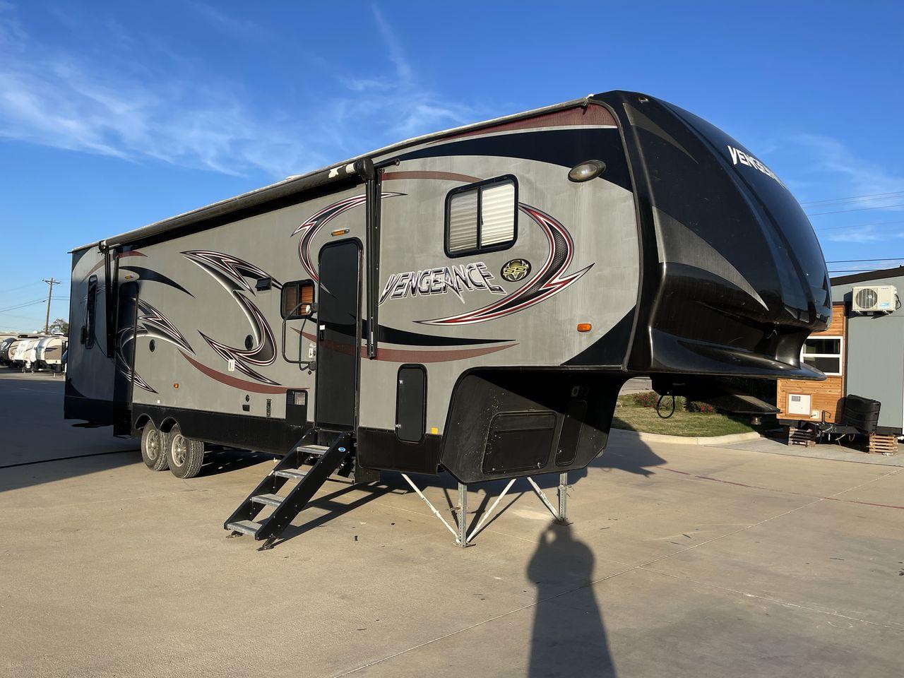 2014 WHITE FOREST RIVER VENGEANCE 312A (4X4FVGG22EY) , Length: 37.92 ft. | Dry Weight: 10,068 lbs. | Gross Weight: 14,508 lbs. | Slides: 1 transmission, located at 4319 N Main St, Cleburne, TX, 76033, (817) 678-5133, 32.385960, -97.391212 - This 2014 Vengeance Toy Hauler has a dry weight of 10,068 lbs and a GVWR of 14,508 lbs with a hitch weight of 2,508 lbs. This unit also has automatic heating and cooling for optimal temperature control. The exterior of this toy hauler is a simple cream base with black and red accents. This model als - Photo #23