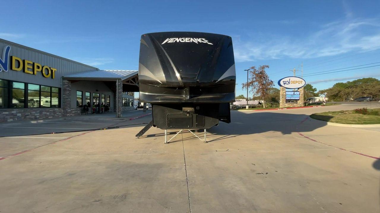 2014 WHITE FOREST RIVER VENGEANCE 312A (4X4FVGG22EY) , Length: 37.92 ft. | Dry Weight: 10,068 lbs. | Gross Weight: 14,508 lbs. | Slides: 1 transmission, located at 4319 N Main St, Cleburne, TX, 76033, (817) 678-5133, 32.385960, -97.391212 - This 2014 Vengeance Toy Hauler has a dry weight of 10,068 lbs and a GVWR of 14,508 lbs with a hitch weight of 2,508 lbs. This unit also has automatic heating and cooling for optimal temperature control. The exterior of this toy hauler is a simple cream base with black and red accents. This model als - Photo #4