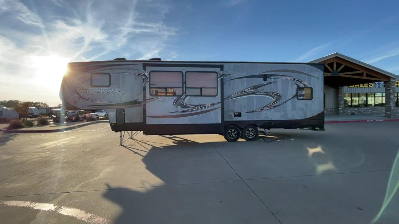2014 WHITE FOREST RIVER VENGEANCE 312A (4X4FVGG22EY) , Length: 37.92 ft. | Dry Weight: 10,068 lbs. | Gross Weight: 14,508 lbs. | Slides: 1 transmission, located at 4319 N Main St, Cleburne, TX, 76033, (817) 678-5133, 32.385960, -97.391212 - This 2014 Vengeance Toy Hauler has a dry weight of 10,068 lbs and a GVWR of 14,508 lbs with a hitch weight of 2,508 lbs. This unit also has automatic heating and cooling for optimal temperature control. The exterior of this toy hauler is a simple cream base with black and red accents. This model als - Photo #6
