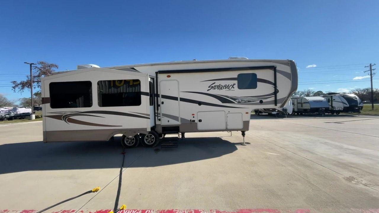 2015 TAN FOREST RIVER CEDAR CREEK 29RE (4X4FCRE21FS) , Length: 33.92 ft. | Dry Weight: 9,790 lbs. | Gross Weight: 13,615 lbs. | Slides: 3 transmission, located at 4319 N Main St, Cleburne, TX, 76033, (817) 678-5133, 32.385960, -97.391212 - Photo #2
