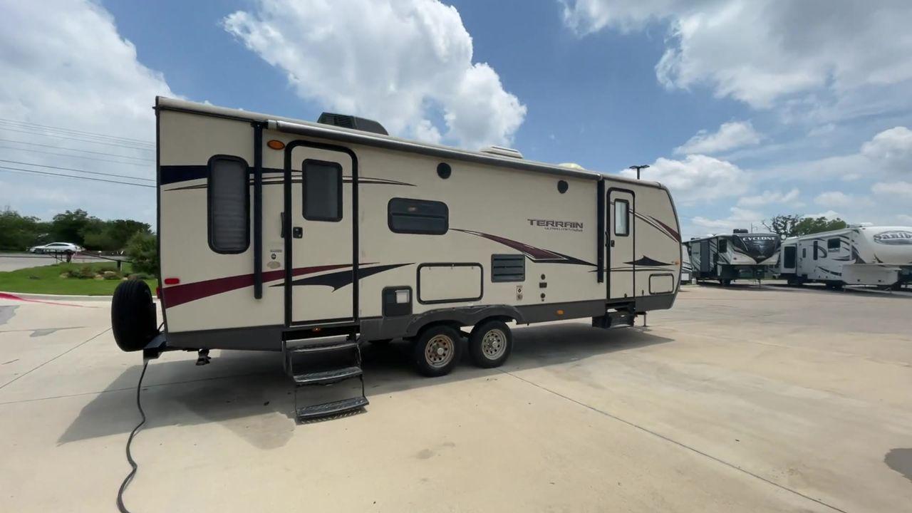 2014 TAN KEYSTONE OUTBACK TERRAIN 273T (4YDT27323EB) , Length: 30 ft. | Dry Weight: 5,758 lbs. | Gross Weight: 7,800 lbs. | Slides: 1 transmission, located at 4319 N Main St, Cleburne, TX, 76033, (817) 678-5133, 32.385960, -97.391212 - With the 2014 Keystone Outback Terrain 273TRL travel trailer, set out on your next adventure. This well-thought-out RV offers the ideal balance of flair and utility, making it a home away from home for your journeys. The dimensions of this unit are 30 ft in length, 8 ft in width, and 10.92 ft in - Photo #1