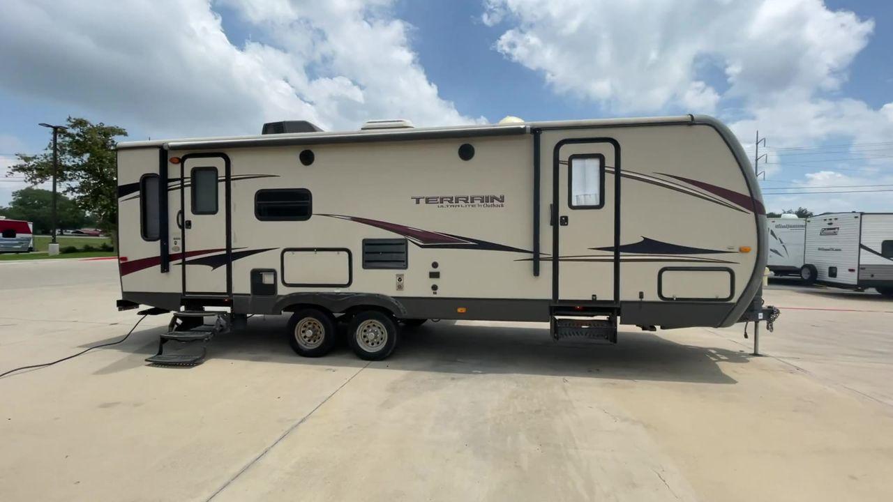 2014 TAN KEYSTONE OUTBACK TERRAIN 273T (4YDT27323EB) , Length: 30 ft. | Dry Weight: 5,758 lbs. | Gross Weight: 7,800 lbs. | Slides: 1 transmission, located at 4319 N Main St, Cleburne, TX, 76033, (817) 678-5133, 32.385960, -97.391212 - With the 2014 Keystone Outback Terrain 273TRL travel trailer, set out on your next adventure. This well-thought-out RV offers the ideal balance of flair and utility, making it a home away from home for your journeys. The dimensions of this unit are 30 ft in length, 8 ft in width, and 10.92 ft in - Photo #2