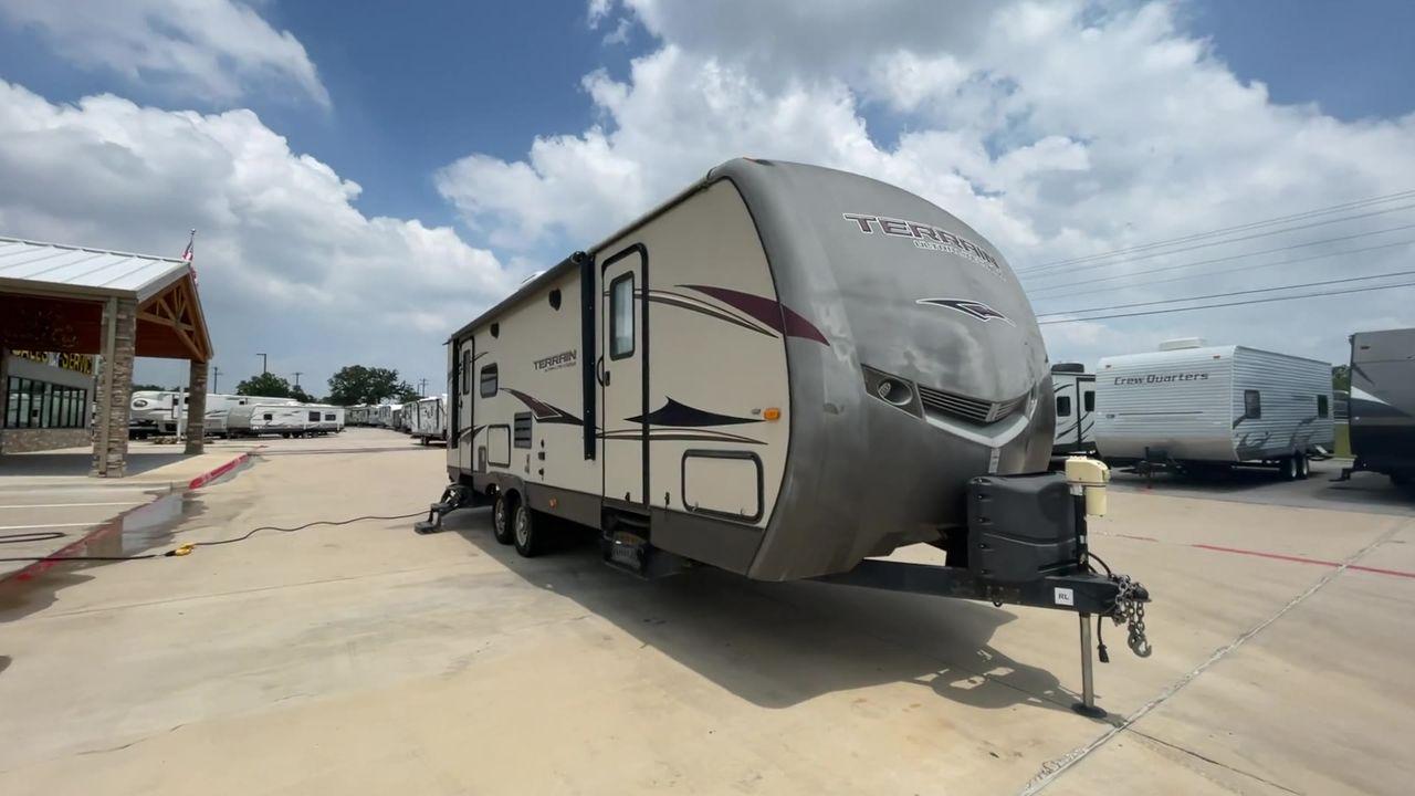 2014 TAN KEYSTONE OUTBACK TERRAIN 273T (4YDT27323EB) , Length: 30 ft. | Dry Weight: 5,758 lbs. | Gross Weight: 7,800 lbs. | Slides: 1 transmission, located at 4319 N Main St, Cleburne, TX, 76033, (817) 678-5133, 32.385960, -97.391212 - With the 2014 Keystone Outback Terrain 273TRL travel trailer, set out on your next adventure. This well-thought-out RV offers the ideal balance of flair and utility, making it a home away from home for your journeys. The dimensions of this unit are 30 ft in length, 8 ft in width, and 10.92 ft in - Photo #3