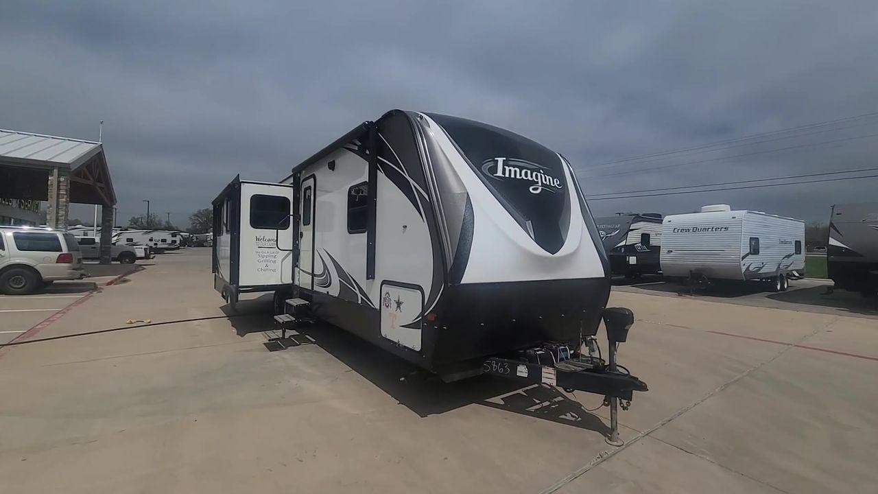 2018 WHITE IMAGINE 2950RL (573TE3325J6) , Length: 34 ft | Dry Weight: 6,985 lbs | Gross Weight: 8,995 lbs | Slides: 2 transmission, located at 4319 N Main St, Cleburne, TX, 76033, (817) 678-5133, 32.385960, -97.391212 - Appreciate the cozy feel during a camping vacation with your family in this 2018 Imagine 2950RL travel trailer. This unit measures in 33.67 ft length, 11 ft in height, and 6.75 ft in interior height. It has a dry weight of 6,985 lbs with a GVWR of 8,995 lbs and a hitch weight of 795 lbs. The 2950RL - Photo #3
