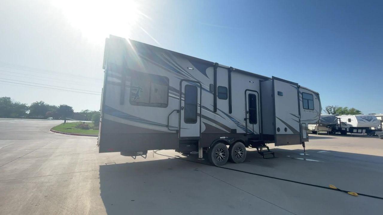 2017 WHITE HEARTLAND ROAD WARRIOR 362 (5SFCG3927HE) , Length: 39.17 ft. | Dry Weight: 15,305 lbs. | Gross Weight: 17,000 lbs | Slides: 3 transmission, located at 4319 N Main St, Cleburne, TX, 76033, (817) 678-5133, 32.385960, -97.391212 - This 2017 Heartland Road Warrior RW362 toy hauler measures 39'2". It is a dual axle, aluminum wheel setup with electric drum brakes. Its dry weight is 15,305 lbs, its payload capacity is 1,635 lbs, its hitch weight is 3,485 lbs, and the GVWR is 17,000 lbs. The fiberglass exterior is painted white wi - Photo #2