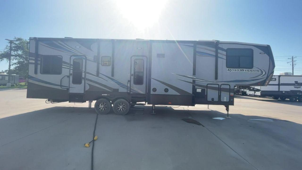 2017 WHITE HEARTLAND ROAD WARRIOR 362 (5SFCG3927HE) , Length: 39.17 ft. | Dry Weight: 15,305 lbs. | Gross Weight: 17,000 lbs | Slides: 3 transmission, located at 4319 N Main St, Cleburne, TX, 76033, (817) 678-5133, 32.385960, -97.391212 - This 2017 Heartland Road Warrior RW362 toy hauler measures 39'2". It is a dual axle, aluminum wheel setup with electric drum brakes. Its dry weight is 15,305 lbs, its payload capacity is 1,635 lbs, its hitch weight is 3,485 lbs, and the GVWR is 17,000 lbs. The fiberglass exterior is painted white wi - Photo #3