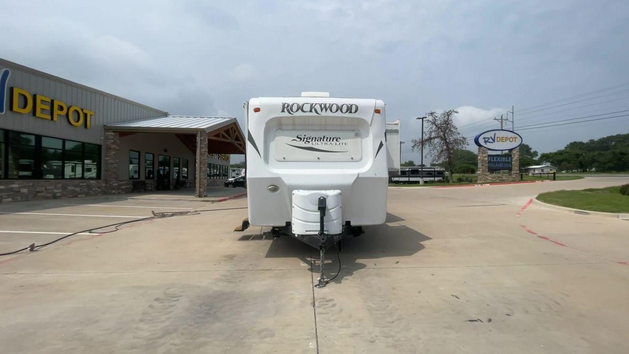 2015 WHITE FOREST RIVER ROCKWOOD 8327SS (4X4TRLH24F1) , Length: 35.25 ft. | Dry Weight: 7,694 lbs. | Gross Weight: 9,150 lbs. | Slides: 4 transmission, located at 4319 N Main Street, Cleburne, TX, 76033, (817) 221-0660, 32.435829, -97.384178 - This 2015 Forest River Rockwood 8327SS travel trailer measures 35.25 ft. It has a width of 8 ft and a height of 9.83 ft. The dry weight is 7,694 lbs, and the payload capacity is 1,456 lbs. It has a GVWR of 9,150 lbs and a hitch weight of 1,035 lbs. It is constructed out of aluminum body material and - Photo #4