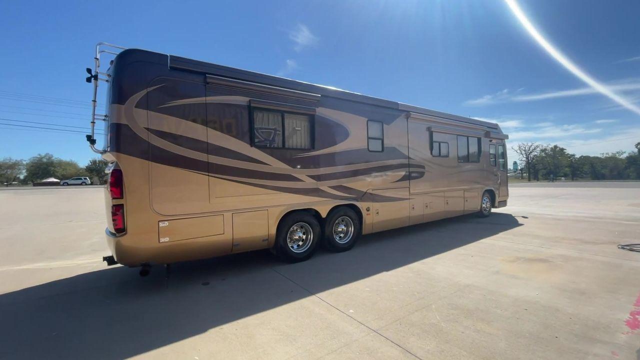 2006 TAN DES MONACO SIGNATURE COMMANDER (1RF17561561) , located at 4319 N Main St, Cleburne, TX, 76033, (817) 678-5133, 32.385960, -97.391212 - The 2006 Monaco Signature 45 is the ultimate in luxury and speed. It is a diesel pusher motorhome that oozes class and precision engineering. This 45-foot wonder shows how dedicated Monaco is to quality work and new ideas. The Signature 45 has a strong diesel engine and is well-built, so it has a sm - Photo #1