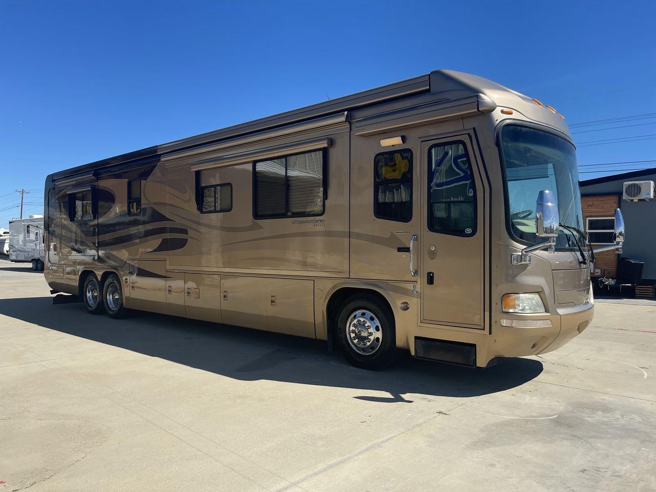 2006 TAN DES MONACO SIGNATURE COMMANDER (1RF17561561) , located at 4319 N Main Street, Cleburne, TX, 76033, (817) 221-0660, 32.435829, -97.384178 - The 2006 Monaco Signature 45 is the ultimate in luxury and speed. It is a diesel pusher motorhome that oozes class and precision engineering. This 45-foot wonder shows how dedicated Monaco is to quality work and new ideas. The Signature 45 has a strong diesel engine and is well-built, so it has a sm - Photo #19