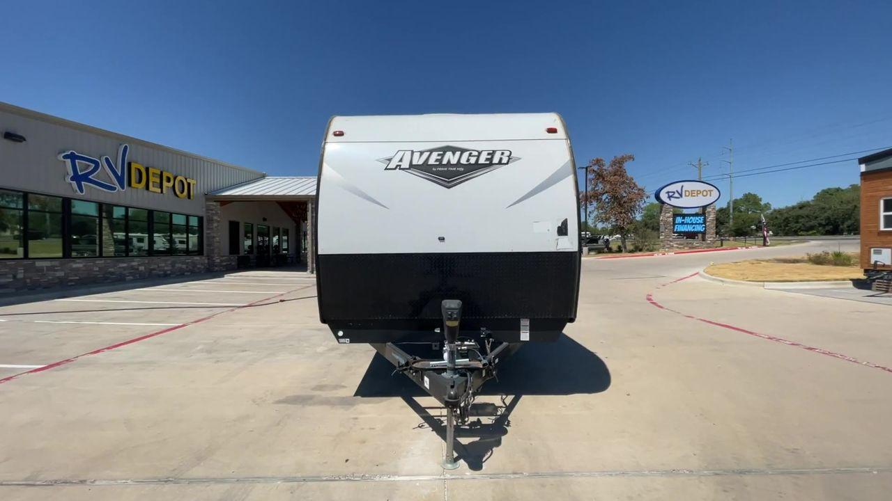 2019 TAN FOREST RIVER AVENGER 32DEN (5ZT2AVXB6KB) , Length: 37.92 ft. | Dry Weight: 7,989 lbs. | Slides: 2 transmission, located at 4319 N Main Street, Cleburne, TX, 76033, (817) 221-0660, 32.435829, -97.384178 - Measuring an impressive 36 feet, this model unfolds to reveal two strategically placed slide-outs, creating a spacious haven for relaxation. The master bedroom welcomes you with a queen-size bed and ample storage, ensuring a peaceful retreat after a day of outdoor exploration. The living area is a h - Photo #4