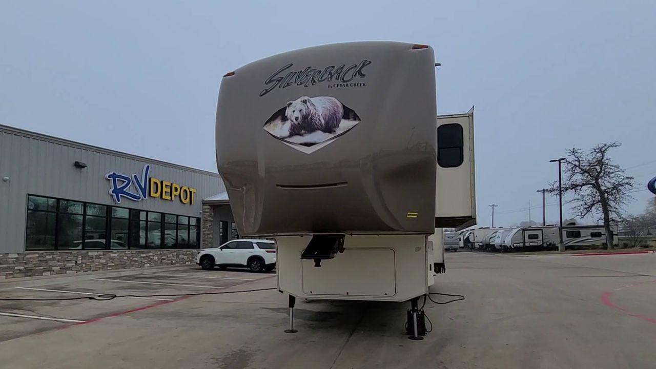 2015 BROWN FOREST RIVER SILVERBACK 29IK (4X4FCRE23FS) , Length: 33.92 ft. | Dry Weight: 10,829 lbs. | Gross Weight: 14,040 lbs. | Slides: 3 transmission, located at 4319 N Main St, Cleburne, TX, 76033, (817) 678-5133, 32.385960, -97.391212 - Photo #4