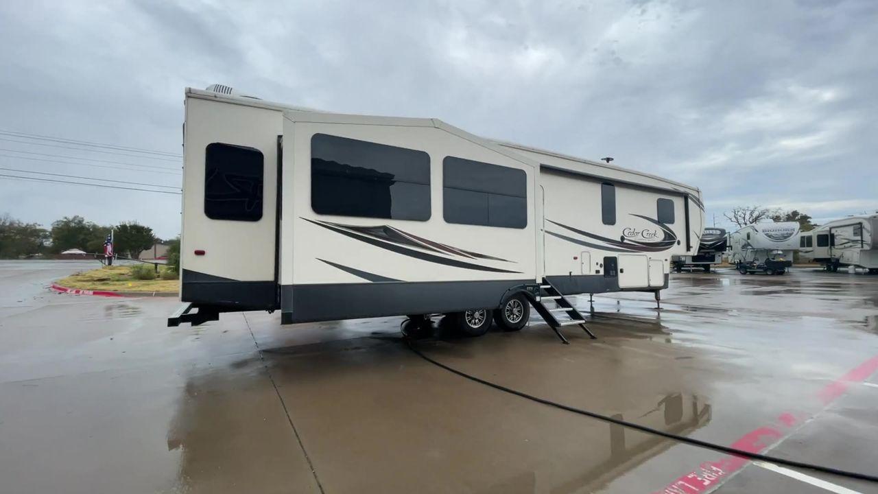 2018 TAN FOREST RIVER CEDAR CREEK 37MBH (4X4FCRN28JS) , located at 4319 N Main St, Cleburne, TX, 76033, (817) 678-5133, 32.385960, -97.391212 - Photo #2