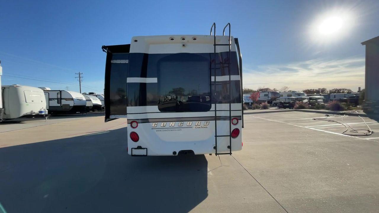 2011 WHITE COACHMEN CONCORD 300TS (1FDEX4FS9BD) , Length: 30.83 ft. | Dry Weight: 12,110 lbs. | Gross Weight: 14,500 lbs. | Slides: 3 transmission, located at 4319 N Main St, Cleburne, TX, 76033, (817) 678-5133, 32.385960, -97.391212 - The 2011 Coachmen Concord 300TS, a class C motorhome that redefines travel comfort and convenience. With a length of 31 feet, this well-maintained model is built on a Ford E450 chassis, powered by a dependable Triton V10 engine, ensuring a smooth and reliable journey. The Concord 300TS features thre - Photo #8