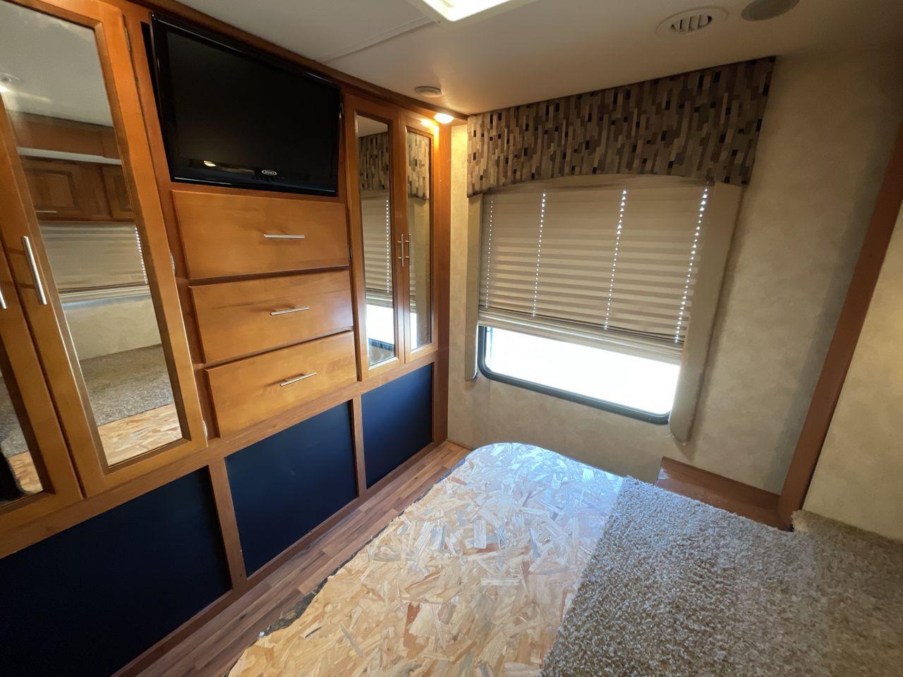 2011 WHITE COACHMEN CONCORD 300TS (1FDEX4FS9BD) , Length: 30.83 ft. | Dry Weight: 12,110 lbs. | Gross Weight: 14,500 lbs. | Slides: 3 transmission, located at 4319 N Main St, Cleburne, TX, 76033, (817) 678-5133, 32.385960, -97.391212 - The 2011 Coachmen Concord 300TS, a class C motorhome that redefines travel comfort and convenience. With a length of 31 feet, this well-maintained model is built on a Ford E450 chassis, powered by a dependable Triton V10 engine, ensuring a smooth and reliable journey. The Concord 300TS features thre - Photo #17
