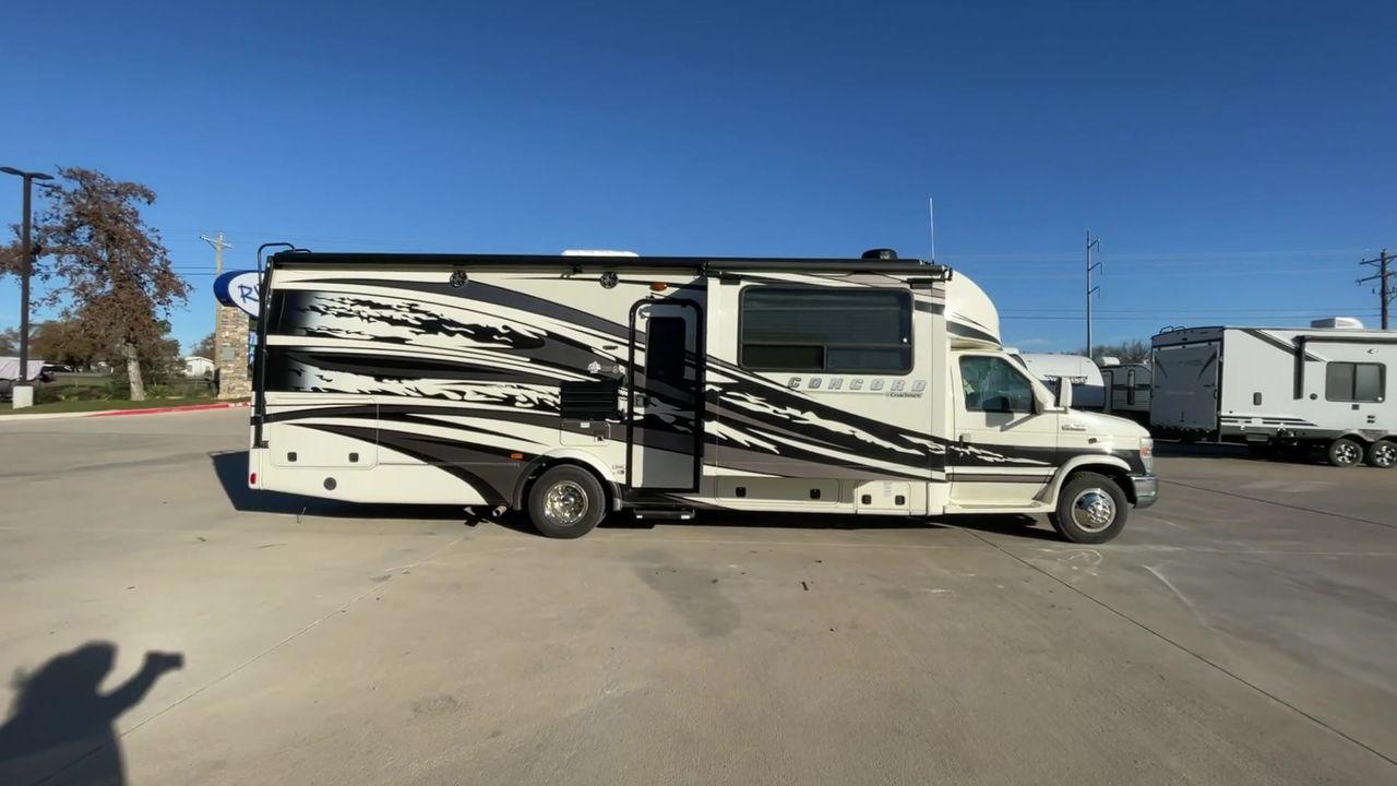 2011 WHITE COACHMEN CONCORD 300TS (1FDEX4FS9BD) , Length: 30.83 ft. | Dry Weight: 12,110 lbs. | Gross Weight: 14,500 lbs. | Slides: 3 transmission, located at 4319 N Main St, Cleburne, TX, 76033, (817) 678-5133, 32.385960, -97.391212 - The 2011 Coachmen Concord 300TS, a class C motorhome that redefines travel comfort and convenience. With a length of 31 feet, this well-maintained model is built on a Ford E450 chassis, powered by a dependable Triton V10 engine, ensuring a smooth and reliable journey. The Concord 300TS features thre - Photo #2