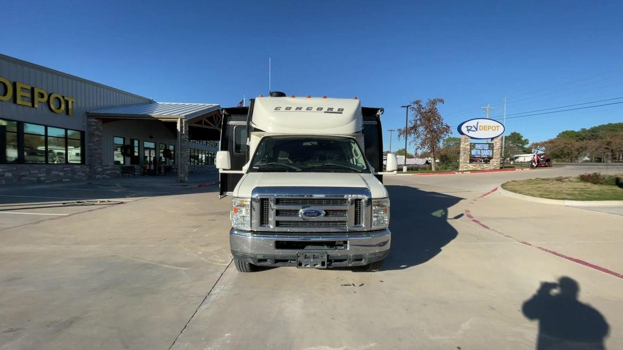 2011 WHITE COACHMEN CONCORD 300TS (1FDEX4FS9BD) , Length: 30.83 ft. | Dry Weight: 12,110 lbs. | Gross Weight: 14,500 lbs. | Slides: 3 transmission, located at 4319 N Main St, Cleburne, TX, 76033, (817) 678-5133, 32.385960, -97.391212 - The 2011 Coachmen Concord 300TS, a class C motorhome that redefines travel comfort and convenience. With a length of 31 feet, this well-maintained model is built on a Ford E450 chassis, powered by a dependable Triton V10 engine, ensuring a smooth and reliable journey. The Concord 300TS features thre - Photo #4