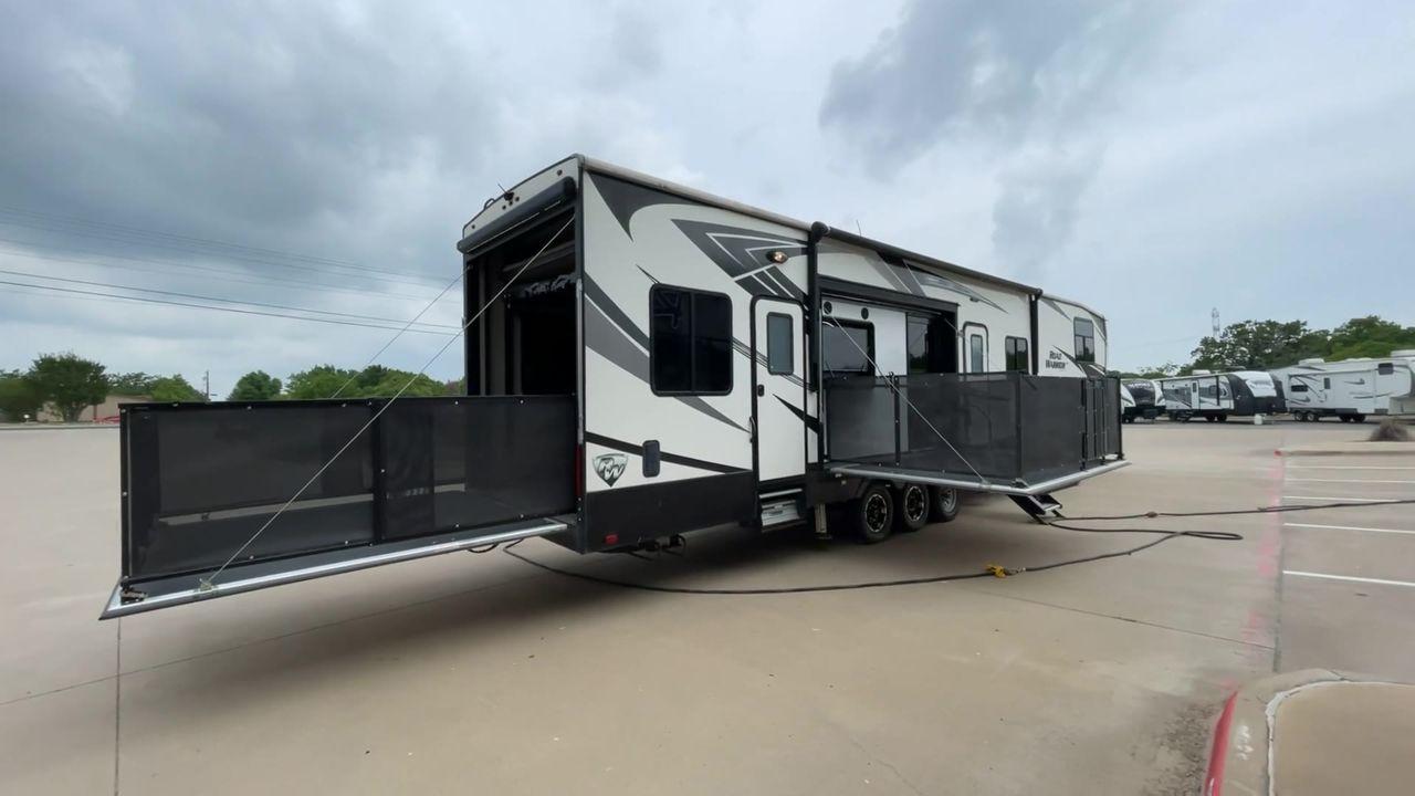 2019 HEARTLAND ROAD WARRIOR 427RW (5SFCG4435KE) , Length: 44.08 ft. | Dry Weight: 16,400 lbs. | Gross Weight: 20,000 lbs. | Slides: 2 transmission, located at 4319 N Main Street, Cleburne, TX, 76033, (817) 221-0660, 32.435829, -97.384178 - The 2019 Heartland Road Warrior 427RW fifth wheel toy hauler is ready for your next journey. The length of this amazing RV is 44.08 feet, its dry weight is 16,400 lbs and its gross weight is 20,000 lbs. This makes it stable and long-lasting on the road. This RV is strong and stylish, with two slides - Photo #1