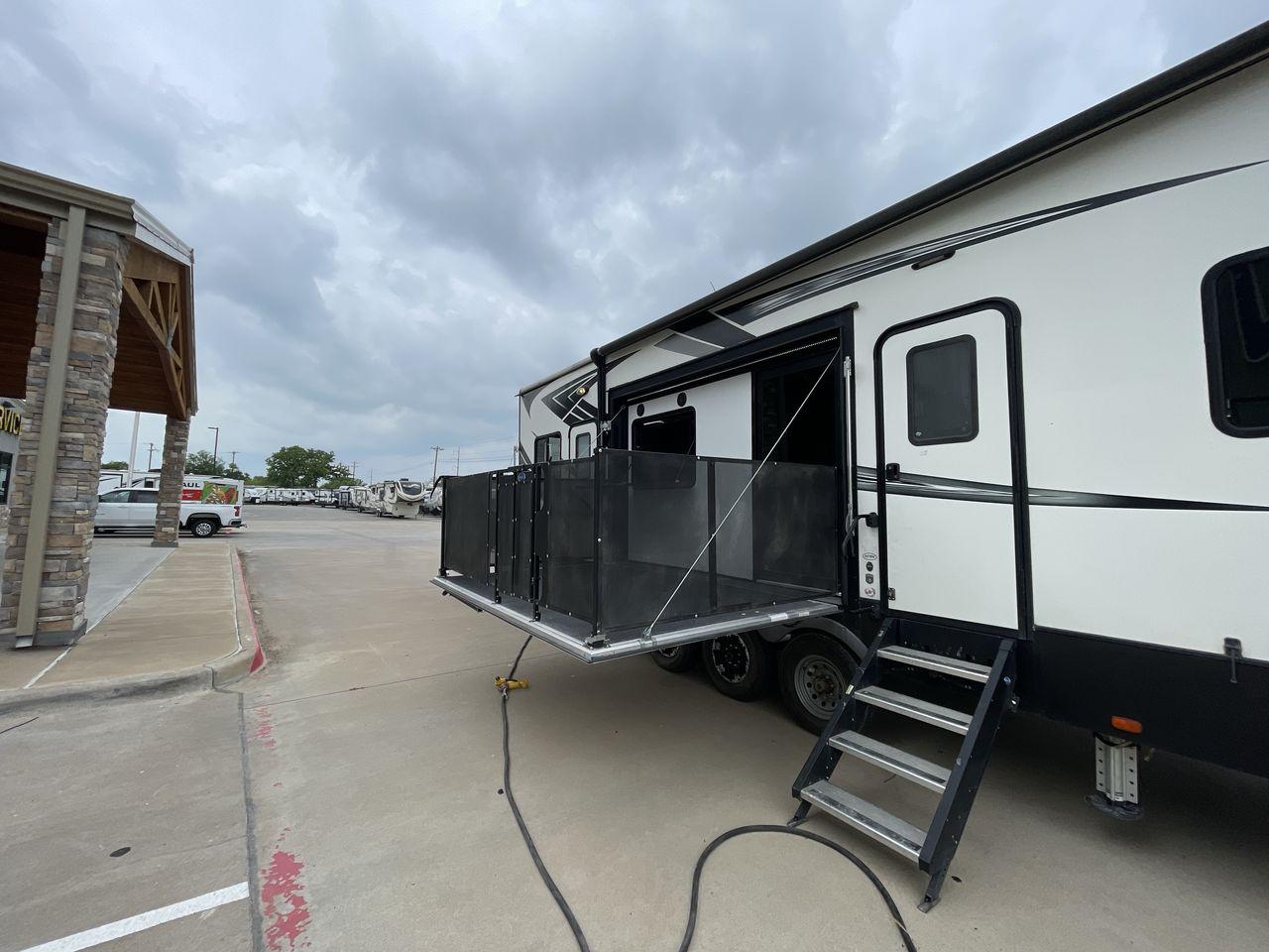 2019 HEARTLAND ROAD WARRIOR 427RW (5SFCG4435KE) , Length: 44.08 ft. | Dry Weight: 16,400 lbs. | Gross Weight: 20,000 lbs. | Slides: 2 transmission, located at 4319 N Main Street, Cleburne, TX, 76033, (817) 221-0660, 32.435829, -97.384178 - The 2019 Heartland Road Warrior 427RW fifth wheel toy hauler is ready for your next journey. The length of this amazing RV is 44.08 feet, its dry weight is 16,400 lbs and its gross weight is 20,000 lbs. This makes it stable and long-lasting on the road. This RV is strong and stylish, with two slides - Photo #23