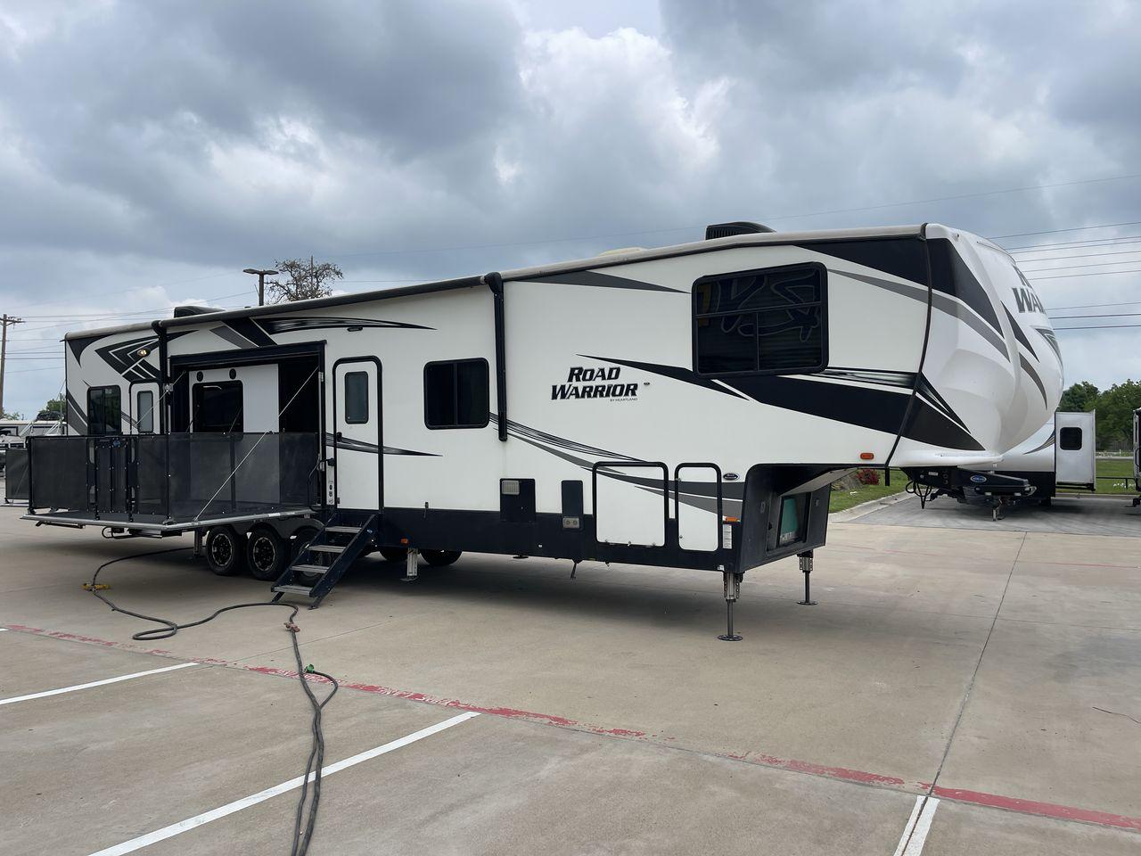 2019 HEARTLAND ROAD WARRIOR 427RW (5SFCG4435KE) , Length: 44.08 ft. | Dry Weight: 16,400 lbs. | Gross Weight: 20,000 lbs. | Slides: 2 transmission, located at 4319 N Main Street, Cleburne, TX, 76033, (817) 221-0660, 32.435829, -97.384178 - The 2019 Heartland Road Warrior 427RW fifth wheel toy hauler is ready for your next journey. The length of this amazing RV is 44.08 feet, its dry weight is 16,400 lbs and its gross weight is 20,000 lbs. This makes it stable and long-lasting on the road. This RV is strong and stylish, with two slides - Photo #28