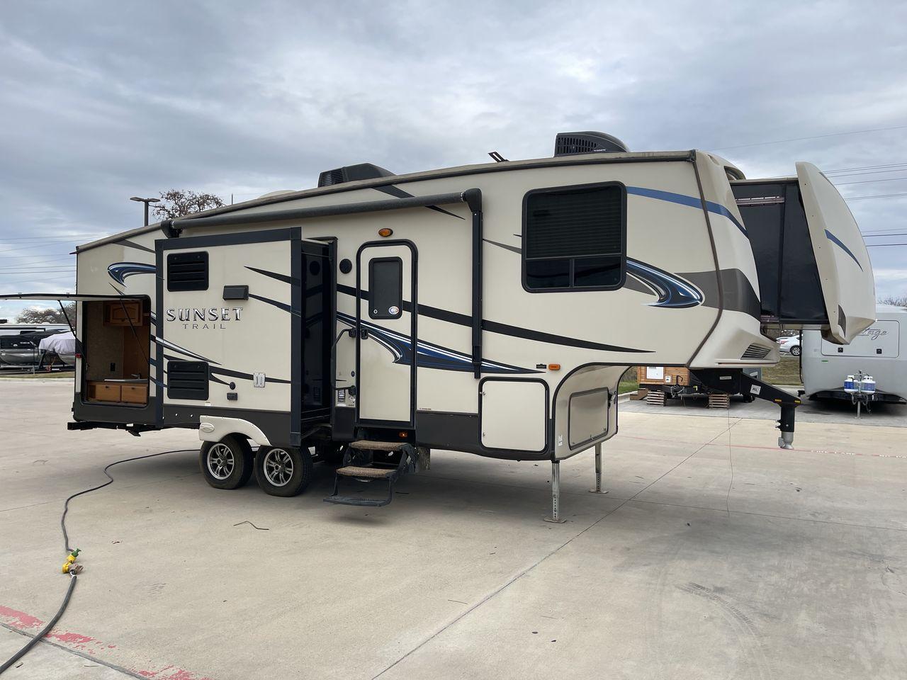2015 CROSSROADS SUNSET TRAIL RESERVE (4V0FC2624FB) , Length: 30.17 ft | Dry Weight: 6,401 lbs | Gross Weight: 9,542 lbs | Slides: 2 transmission, located at 4319 N Main St, Cleburne, TX, 76033, (817) 678-5133, 32.385960, -97.391212 - This model has the right mix of space and maneuverability, with a length of 30 feet and a dry weight of 6,401 pounds. With a strong aluminum frame and fiberglass sidewalls, it will last for a long time on the road, making it a great choice for travelers who want both style and dependability. The Sun - Photo #23