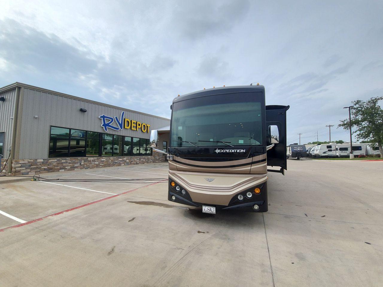 2016 BLACK DES FLEETWOOD EXPEDITION 38K (4UZACWDT2GC) , Length: 38.62 ft | Gross Weight: 32,400 lbs. | Slides: 3 transmission, located at 4319 N Main St, Cleburne, TX, 76033, (817) 678-5133, 32.385960, -97.391212 - The 2016 Fleetwood Expedition 36K motorhome runs for about 50,505 miles. The dimensions are 38.62 ft in length, 8.5 ft in width, 12.83 ft in height, 7 ft interior height, and a wheelbase of 21 ft. It has a towing capacity of 10,000 lbs and a GVWR of 32,400 lbs. There are three total slideouts and on - Photo #26