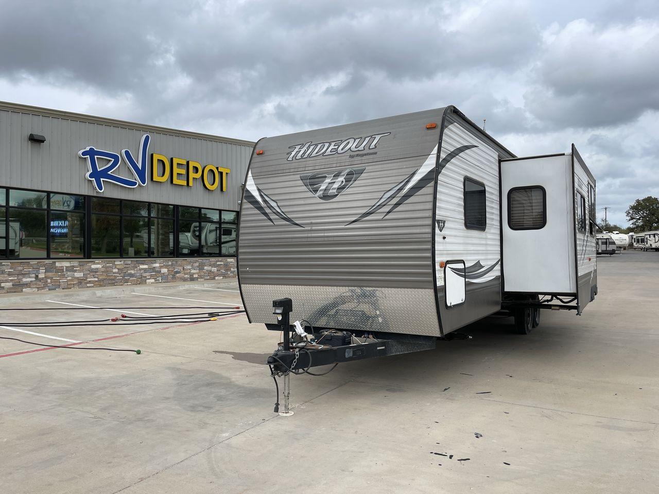 2015 KEYSTONE HIDEOUT 29BHS (4YDT29B23F7) , Length: 34.25 ft. | Dry Weight: 7,225 lbs. | Gross Weight: 9,675 lbs. | Slides: 1 transmission, located at 4319 N Main St, Cleburne, TX, 76033, (817) 678-5133, 32.385960, -97.391212 - Photo #1