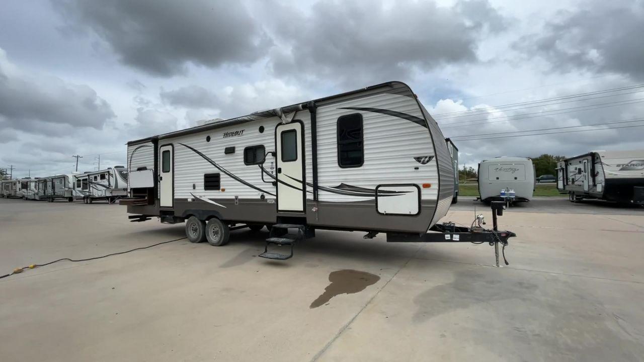 2015 KEYSTONE HIDEOUT 29BHS (4YDT29B23F7) , Length: 34.25 ft. | Dry Weight: 7,225 lbs. | Gross Weight: 9,675 lbs. | Slides: 1 transmission, located at 4319 N Main St, Cleburne, TX, 76033, (817) 678-5133, 32.385960, -97.391212 - Photo #4