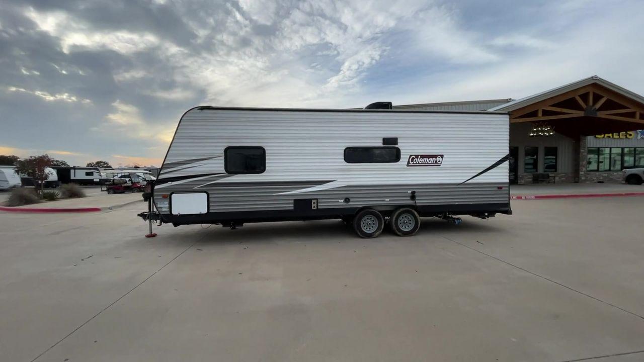 2021 WHITE KEYSTONE COLEMAN 274BH (4YDT27429MH) , Length: 28.58 ft. | Dry Weight: 4,789 lbs. | Slides: 0 transmission, located at 4319 N Main Street, Cleburne, TX, 76033, (817) 221-0660, 32.435829, -97.384178 - Set out on an adventure-filled, comfortable journey in the 2021 Keystone Coleman 274BH travel trailer. Families looking for a fun and memorable camping trip will love this well-designed and adaptable travel companion. The dimensions of this unit are 28.58 ft in length, 8 ft in width, and 10.33 ft - Photo #6