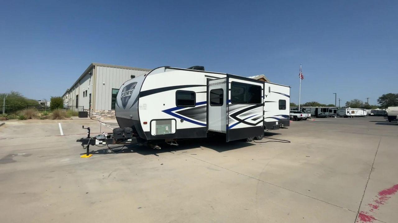 2018 GRAY HEARTLAND FURY 2910 (5ZT2FHUB2JG) , Length: 34.5 ft. | Dry Weight: 7,262 lbs. | Slides: 1 transmission, located at 4319 N Main Street, Cleburne, TX, 76033, (817) 221-0660, 32.435829, -97.384178 - The 2018 Prime Time Fury 2910 is a rugged and versatile toy hauler that seamlessly blends functionality with comfort for the ultimate adventure on the road. Measuring 34.5 feet in length, this toy hauler boasts an innovative design catered to the needs of outdoor enthusiasts. The Fury 2910 features - Photo #3
