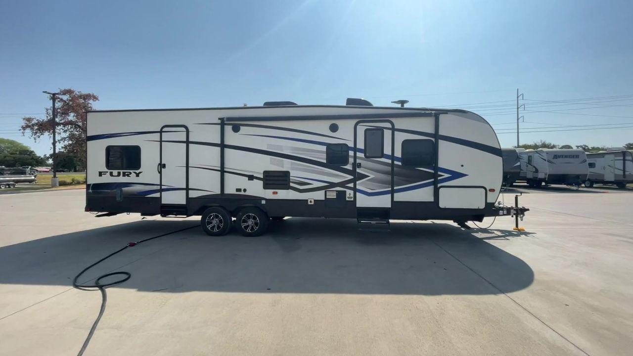 2018 GRAY HEARTLAND FURY 2910 (5ZT2FHUB2JG) , Length: 34.5 ft. | Dry Weight: 7,262 lbs. | Slides: 1 transmission, located at 4319 N Main Street, Cleburne, TX, 76033, (817) 221-0660, 32.435829, -97.384178 - The 2018 Prime Time Fury 2910 is a rugged and versatile toy hauler that seamlessly blends functionality with comfort for the ultimate adventure on the road. Measuring 34.5 feet in length, this toy hauler boasts an innovative design catered to the needs of outdoor enthusiasts. The Fury 2910 features - Photo #6