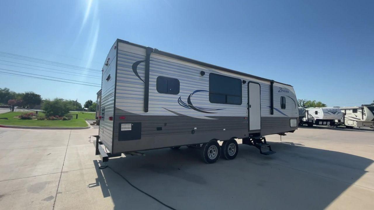 2018 WHITE KEYSTONE ZINGER 280RK (4YDT28021JS) , Length: 32.92 ft. | Dry Weight: 6,570 lbs. | Gross Weight: 9,610 lbs. | Slides: 1 transmission, located at 4319 N Main St, Cleburne, TX, 76033, (817) 678-5133, 32.385960, -97.391212 - Prepare a campout with the family this weekend in this 2018 Keystone Zinger 280RK travel trailer. It features amenities that serve you domestic comfort and convenience on the road! This unit measures 32.92 ft in length, 8 ft in width, 11.17 ft in height, and 6.75 ft in interior height. It has a dry - Photo #1