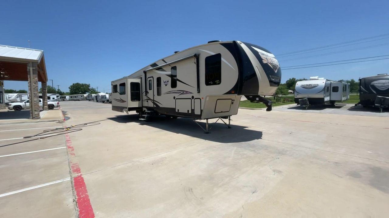 2017 FOREST RIVER SABRE 365MB (4X4FSRN22H3) , Length: 42.42 ft | Dry Weight: 12,994 lbs | Gross Weight: 15,500 lbs | Slides: 4 transmission, located at 4319 N Main Street, Cleburne, TX, 76033, (817) 221-0660, 32.435829, -97.384178 - The 2017 Forest River Sabre 365MB is a roomy fifth wheel that is meant to make camping trips more comfortable. With its spacious layout and thoughtful features, this RV provides a luxury home away from home. The unit measures 42.42 feet in length and weighs 12,994 lbs. dry, offers enough space for r - Photo #3