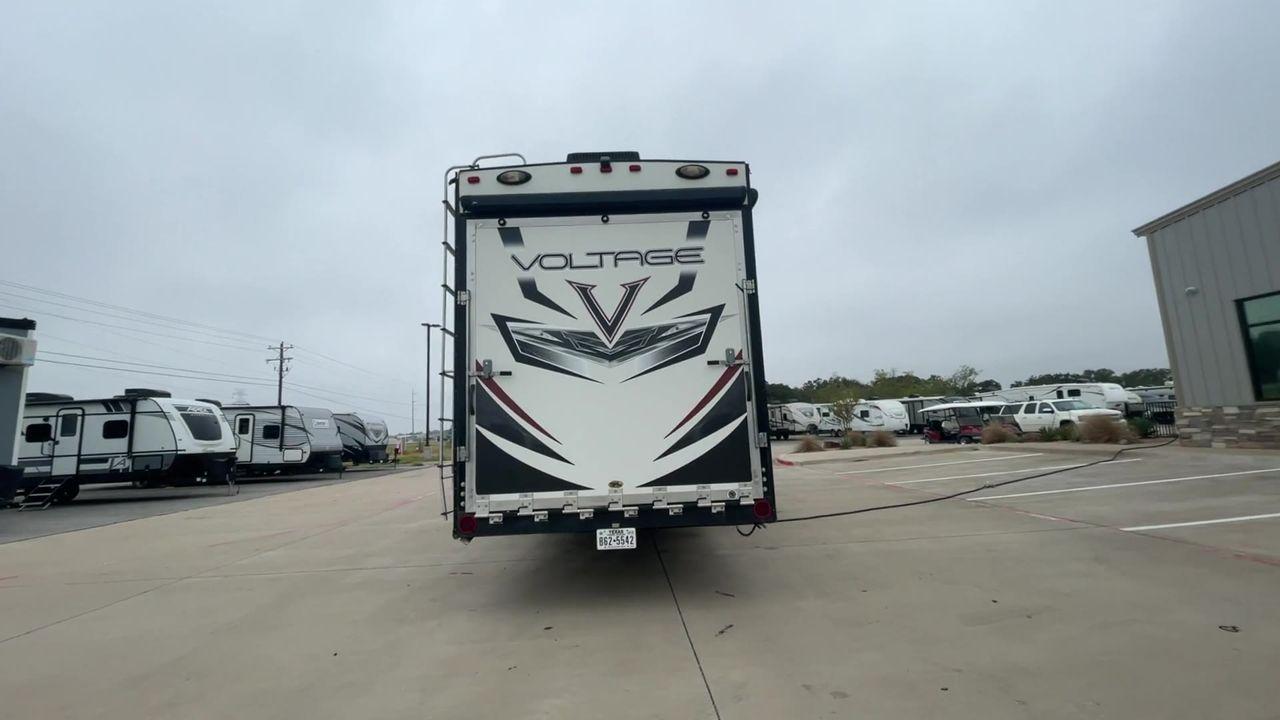 2014 DUTCHMEN VOLTAGE 3970 (47CFVTV33EC) , Length: 44 ft. Slides: 3 transmission, located at 4319 N Main St, Cleburne, TX, 76033, (817) 678-5133, 32.385960, -97.391212 - This 2014 Dutchmen Voltage 3970 has you covered when it comes to spaciousness, comfort, and luxury! This toy hauler is a triple-axle aluminum wheel set-up measuring 44 ft. in length and 13.33 ft. in height. It comes with 3 slides to provide more interior flooring. The cargo area has a whole 11 - Photo #10