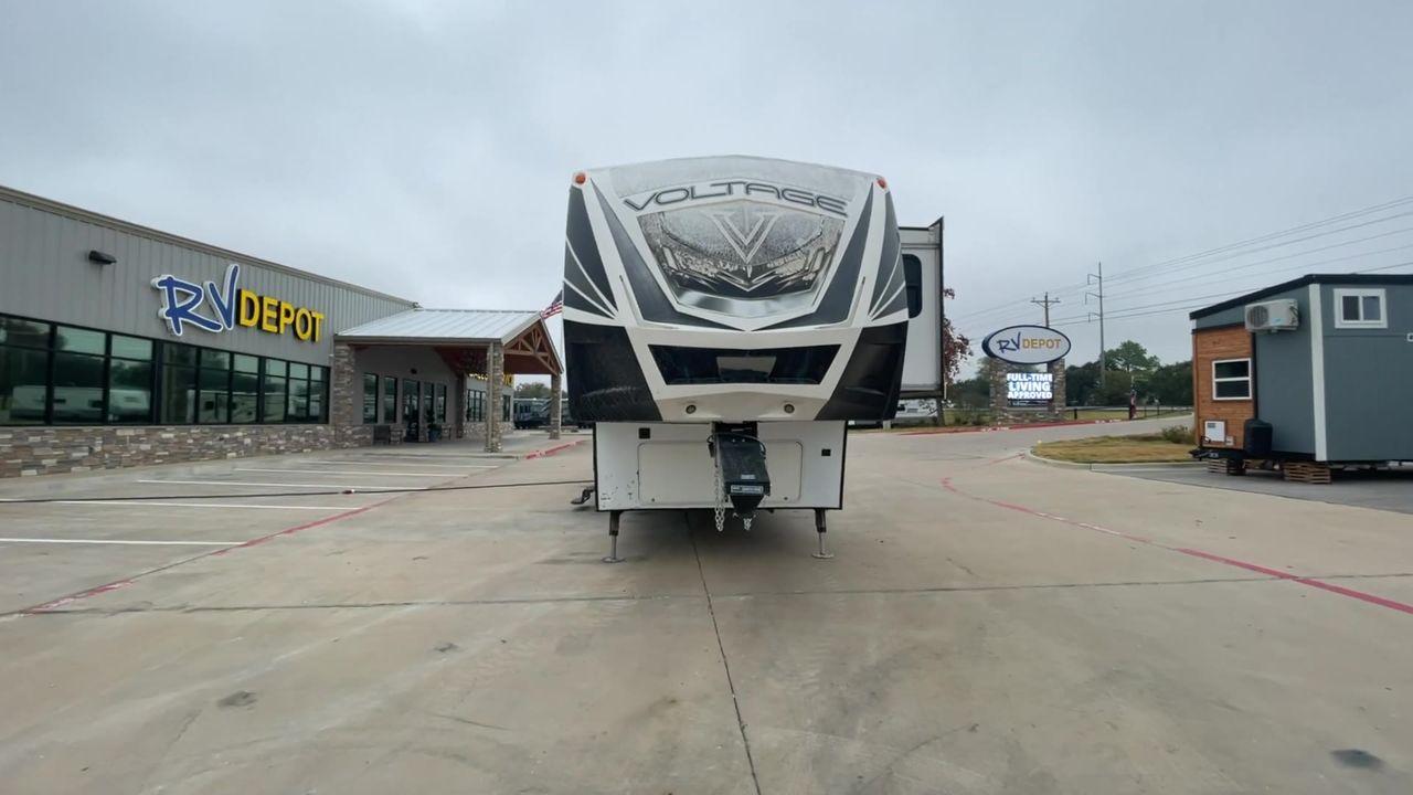 2014 DUTCHMEN VOLTAGE 3970 (47CFVTV33EC) , Length: 44 ft. Slides: 3 transmission, located at 4319 N Main St, Cleburne, TX, 76033, (817) 678-5133, 32.385960, -97.391212 - This 2014 Dutchmen Voltage 3970 has you covered when it comes to spaciousness, comfort, and luxury! This toy hauler is a triple-axle aluminum wheel set-up measuring 44 ft. in length and 13.33 ft. in height. It comes with 3 slides to provide more interior flooring. The cargo area has a whole 11 - Photo #6