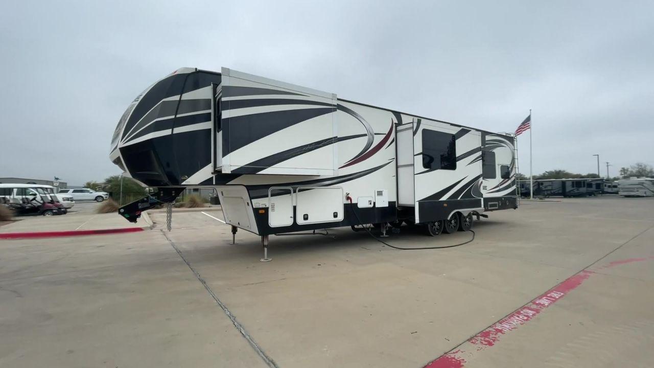 2014 DUTCHMEN VOLTAGE 3970 (47CFVTV33EC) , Length: 44 ft. Slides: 3 transmission, located at 4319 N Main St, Cleburne, TX, 76033, (817) 678-5133, 32.385960, -97.391212 - This 2014 Dutchmen Voltage 3970 has you covered when it comes to spaciousness, comfort, and luxury! This toy hauler is a triple-axle aluminum wheel set-up measuring 44 ft. in length and 13.33 ft. in height. It comes with 3 slides to provide more interior flooring. The cargo area has a whole 11 - Photo #7