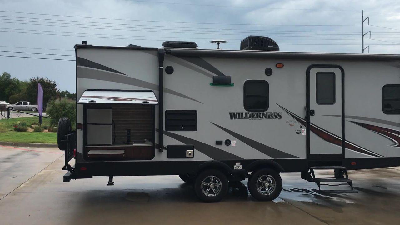 2018 HEARTLAND WILDERNESS 2450FB (5SFNB3022JN) , Length: 30.33 ft. | Dry Weight: 5,433 lbs. | Gross Weight: 6,900 lbs. | Slides: 1 transmission, located at 4319 N Main St, Cleburne, TX, 76033, (817) 678-5133, 32.385960, -97.391212 - With the 2018 Heartland Recreation Wilderness 2450FB travel trailer, set out on an outdoor adventure. For those looking for an unforgettable camping experience, this well-designed RV offers the ideal home away from home thanks to its innovative design, comfort, and functionality. The dimensions of t - Photo #1