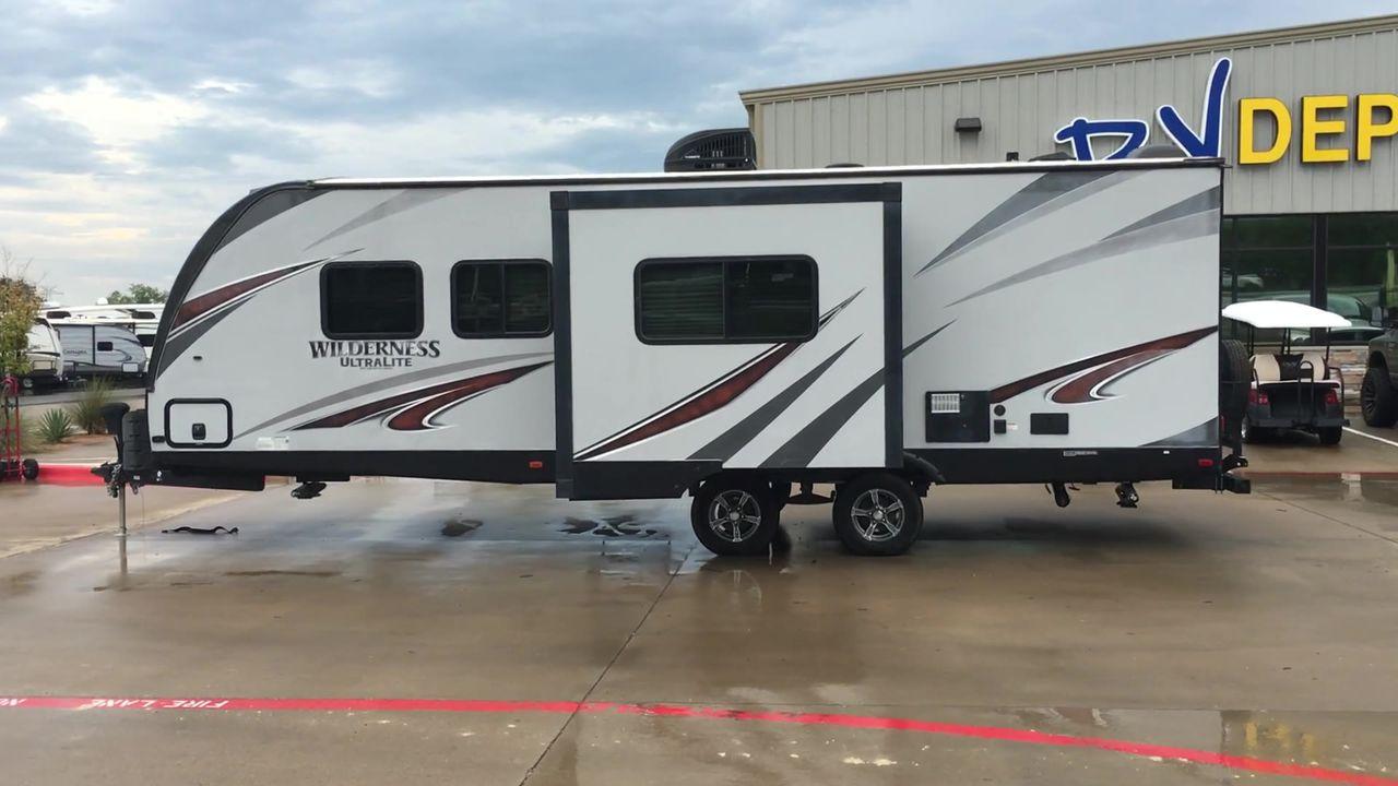 2018 HEARTLAND WILDERNESS 2450FB (5SFNB3022JN) , Length: 30.33 ft. | Dry Weight: 5,433 lbs. | Gross Weight: 6,900 lbs. | Slides: 1 transmission, located at 4319 N Main St, Cleburne, TX, 76033, (817) 678-5133, 32.385960, -97.391212 - With the 2018 Heartland Recreation Wilderness 2450FB travel trailer, set out on an outdoor adventure. For those looking for an unforgettable camping experience, this well-designed RV offers the ideal home away from home thanks to its innovative design, comfort, and functionality. The dimensions of t - Photo #6