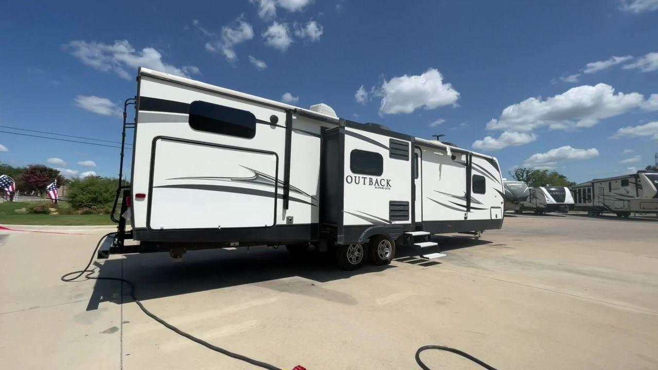 2018 BLACK KEYSTONE RV OUTBACK 325BH (4YDT32520JB) , Length: 37.42 ft. | Dry Weight: 8,428 lbs. | Gross Weight: 10,500 lbs. | Slides: 3 transmission, located at 4319 N Main St, Cleburne, TX, 76033, (817) 678-5133, 32.385960, -97.391212 - Gather the family inside this Outback Super Lite 325BH by Keystone RV, which features a bunkhouse, front bedroom, outside kitchen, and triple slides. The dimensions of this 325BH model are 37.42 ft in length, 8 ft in width, and 11.33 ft in height. It has a dry weight of 8,428 lbs with a payload capa - Photo #2