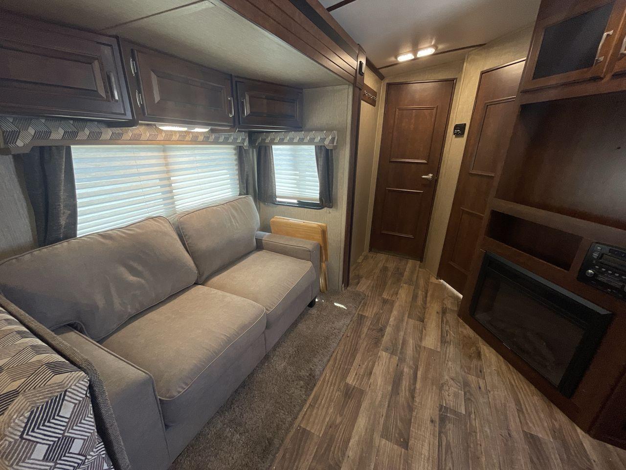 2018 BLACK KEYSTONE RV OUTBACK 325BH (4YDT32520JB) , Length: 37.42 ft. | Dry Weight: 8,428 lbs. | Gross Weight: 10,500 lbs. | Slides: 3 transmission, located at 4319 N Main St, Cleburne, TX, 76033, (817) 678-5133, 32.385960, -97.391212 - Gather the family inside this Outback Super Lite 325BH by Keystone RV, which features a bunkhouse, front bedroom, outside kitchen, and triple slides. The dimensions of this 325BH model are 37.42 ft in length, 8 ft in width, and 11.33 ft in height. It has a dry weight of 8,428 lbs with a payload capa - Photo #13