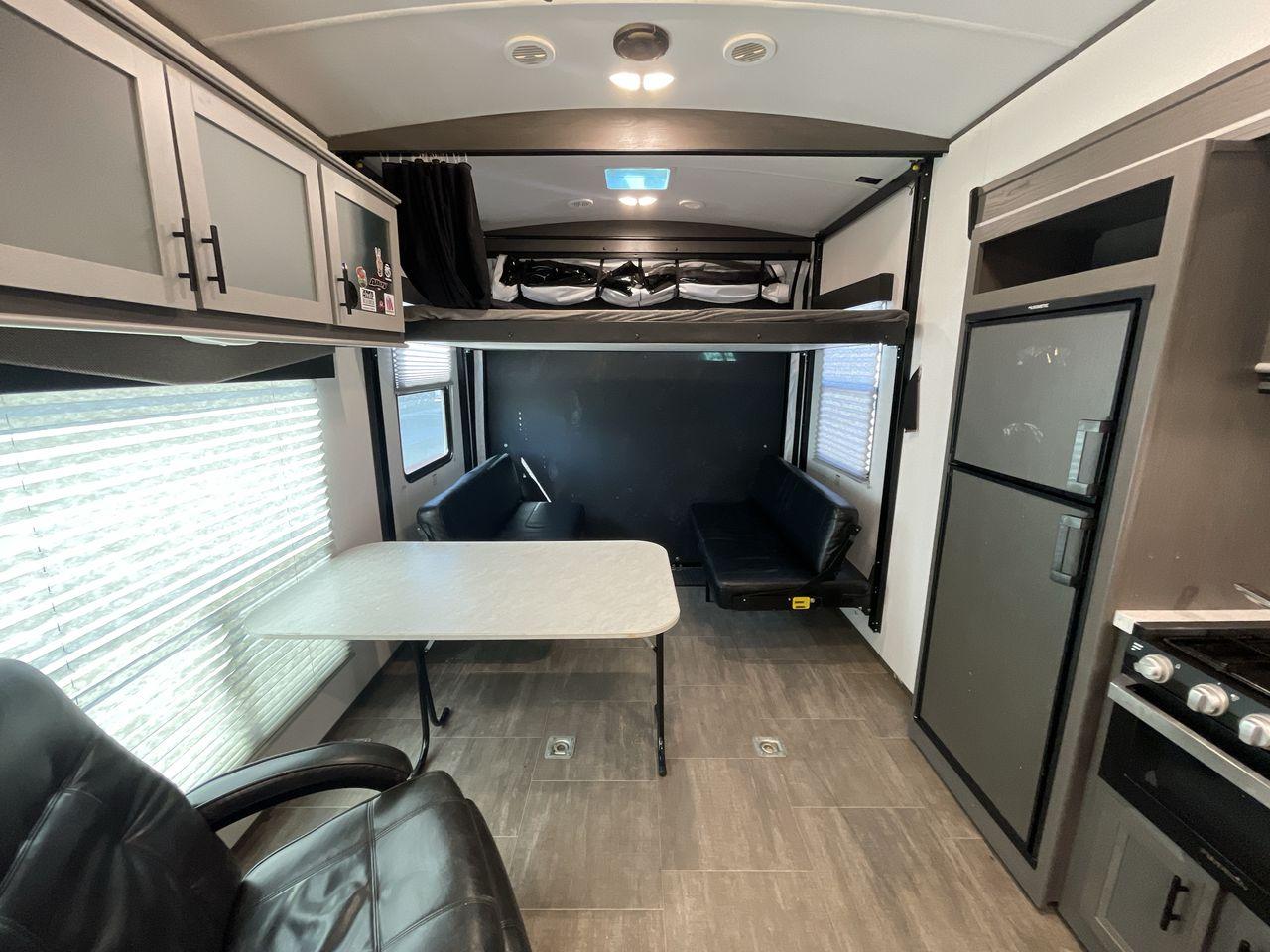 2021 CRUISER RV STRYKER 3414 (5RXGB392XM1) , Length: 38.75 ft. | Dry Weight: 9,608 lbs. | Gross Weight: 12,800 lbs. | Slides: 2 transmission, located at 4319 N Main St, Cleburne, TX, 76033, (817) 678-5133, 32.385960, -97.391212 - The 2021 Cruiser RV Stryker 3414 is a meticulously crafted toy hauler that seamlessly integrates luxury, versatility, and durability to provide an exceptional on-the-road experience. Whether you're a passionate thrill-seeker indulging in outdoor sports or a discerning family seeking comfort, the Str - Photo #12